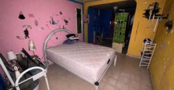 Vendo céntrica casa en equina en La Locería